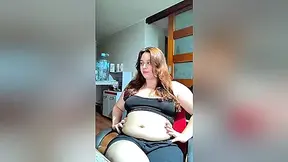 Hot Chubby Woman Filling Her Round Belly With Some Sweets