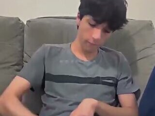 Young Latino jerks off his big cock