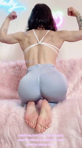 Adorable petite and nerdy Asian muscle girl flexes for you in leggings