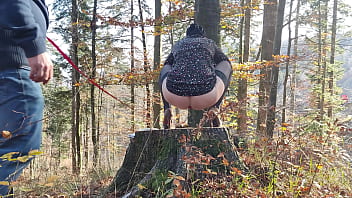 Desperate to pee, she has to pee with leashed butt outdoor