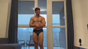 Cocky wrestler found out the hard way, worked out in a hammerlock kicking in pain and drumming the mat with his feet