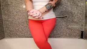whitney morgan pissing orange pants in bathtub omorashi