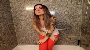 whitney morgan pissing orange pants in bathtub omorashi