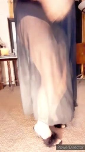 Mature woman Zilah Luz striptease in high heels and nylons