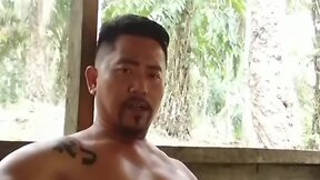 Indonesian muscle daddy gets handjob outdoors from amateur bear with big cock in homemade video: cumshot galore! asian masturbation