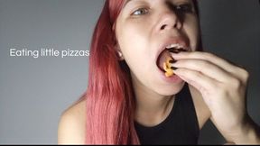 Eating little pizzas