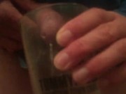 Slow mo piss in cup