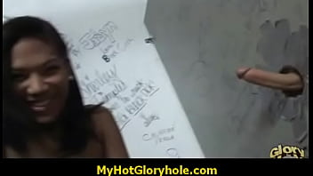 Gloryhole - Ebony sucking a strangers hard cock through the hole in the wall 1