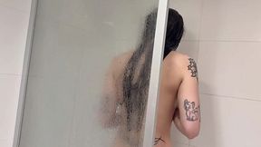 Slutty Bitch Gets Off on Sucking Cock While Her Roommate Jerks Off in the Shower Next to Her