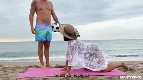 ”Stunning latin Alika Penagos tries to do a yoga video on the beach”