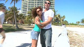 Curly mulatto Misty Stone seduces a man on the beach