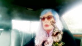 MATURE TG CD SMOKING MORES IN MY RIDE - LOTS OF DANGLING LONG CIGARETTES