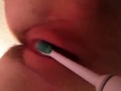 massaging my leaky pussy with a toothbrush