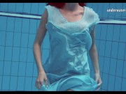 Hot teen unterwasser swims and strips