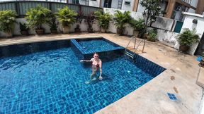 watch us playing in our swimming pool