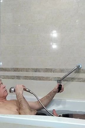 Kinky Mature Guy Masturbates in the Hotel's Room and Bathroom