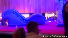 busty Darling naked on public stage