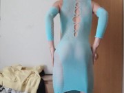 Skinny femboy tries out kinky feminine clothes on camera with erotic music playing in the background
