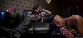 Chance Summerlin in a cigar-and-sweat BDSM bear vid