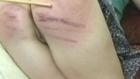 Caned Lesbian Close strokes clip 1