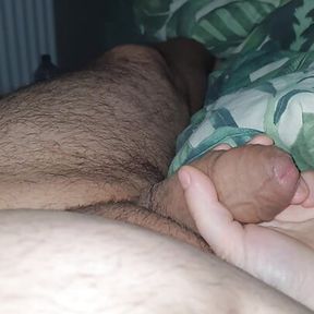 Step son laid down in bed get a handjob from step mom