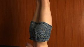 Amanda: topless barefoot girl in jeans shorts is cleave-gagged and suspended upside down on-screen (HD WMV)