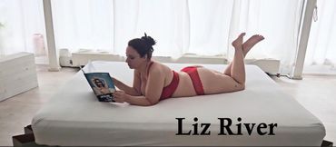 Liz River Barefoot in Red Lingerie on White Bed in Berlin