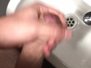 Teen masturbates and cums in public toilet
