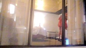 Caught Watching Her in Hotel Window and She Gives Him a Show