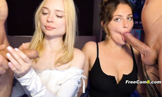 Two Slutty Babes Sucking Cock Side by Side