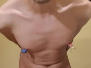 Eating my own cum, with nipple clamps, and pinching my chest. Self BDSM