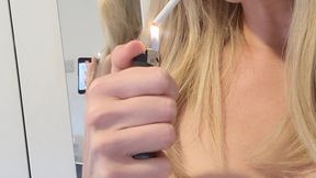 MILF smokes 120s in mirror and plays with her tits