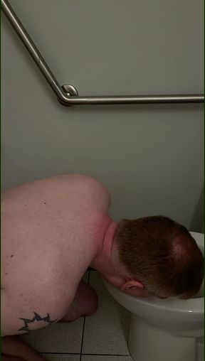 submissive loser licks his cum off a toilet for humiliation.