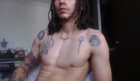 hot tattooed guy flashing his big boner
