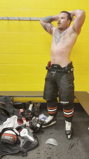 Naked hockey jock changing showering