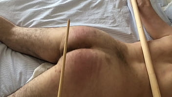 caned cuffed to poles - no escape