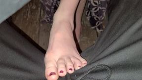 Nightime Under Table closeup Footjob In Pants