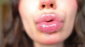 wet messy lipgloss layers and pouting kisses