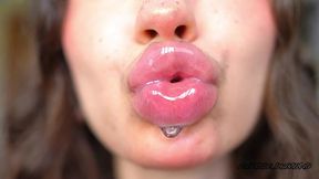wet messy lipgloss layers and pouting kisses