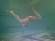 Tight ass finds dildo underwater and swims with it