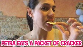 Petra eats a packet of cracker - HD