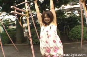 Ayumi Ayukawa Hot Asian model shows her tits in the kitchen