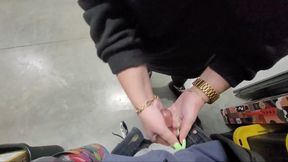 Naughty girl gives handjob to small cock in public storage