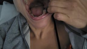 Pulling cheeks fist stuffing