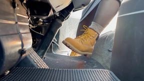 driving car in new timberlands