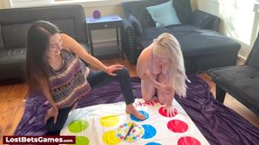 Two sizzling lesbians enjoy a wild strip twister game