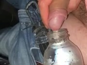 Bi guy fills 2 bottles on highway