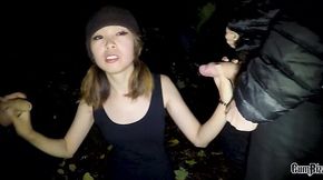 Petite Asian babe swallows massive cock in public deepthroat