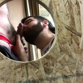 Sucking Two hairy Dicks at the Gloryhole