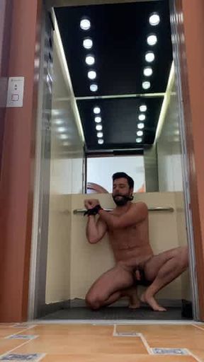 Mistress exposing her slave naked and tied in public elevator